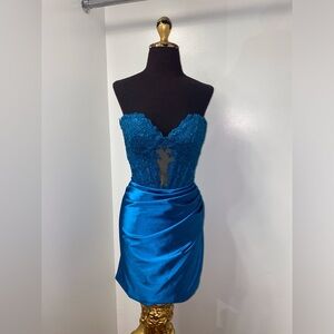 Strapless lace embellished corset fitted gown with keyhole